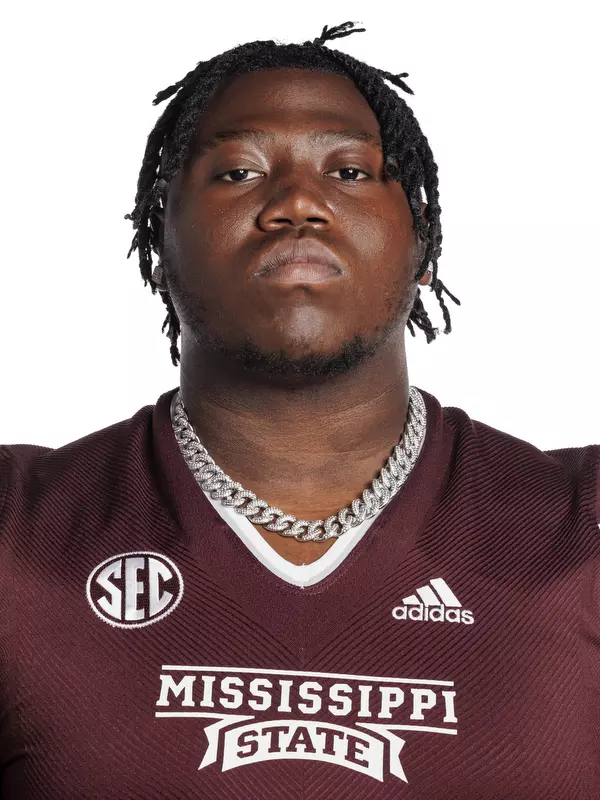 STARKVILLE, MS - May 31, 2022 - Mississippi State Defensive Lineman Kalvin Dinkins headshot taken at the Leo Seal Jr. Football Complex at Mississippi State University in Starkville, MS. Photo By Austin Perryman