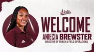 Woods adds Aniecia Brewster To Track And Field Staff