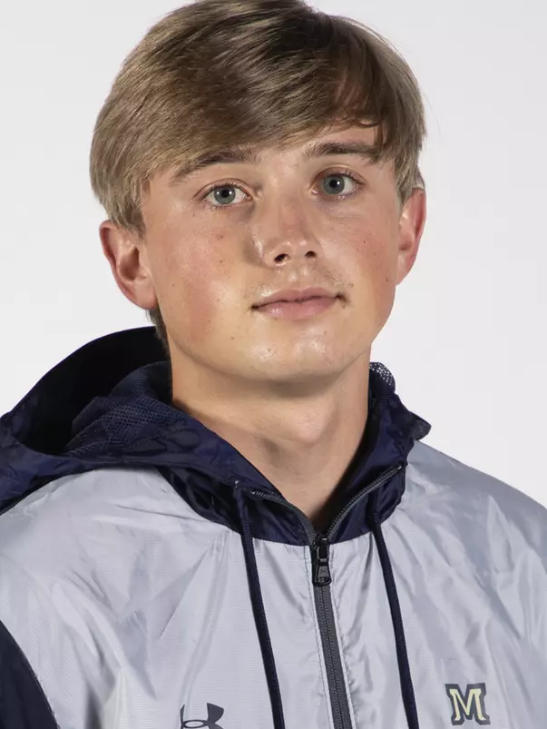 Aidan Binau mug-tennis manager