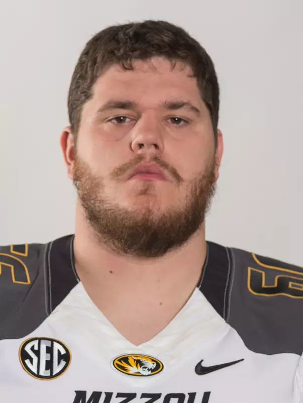 Adam Ploudre Headshot