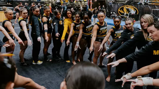 The Mizzou gymnastics team coming together to talk prior to the team's meet against Georgia on Feb. 21, 2025.