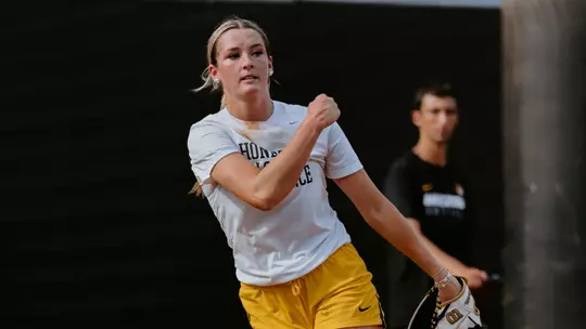Abby Carr pitching in the bullpen during practice