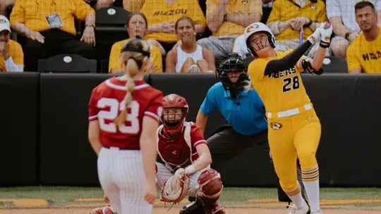 Freshman Abby Carr hits a home run against Alabama in the final game of the series