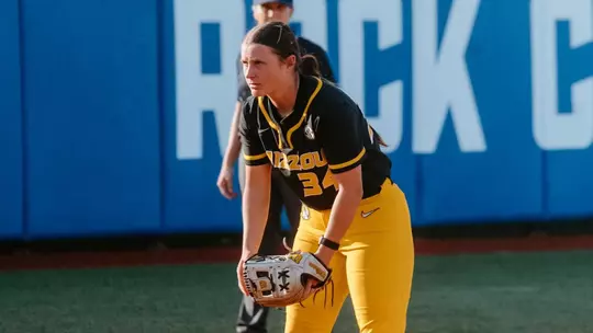 Freshman Addy Waits waits for the ball at third base