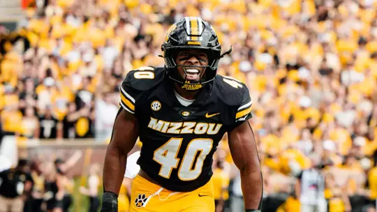 Missouri come from behind to defeat Kansas, 42-31, at Memorial Stadium.