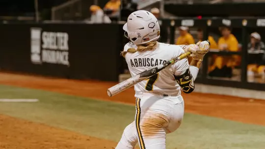 Junior Stefania Abruscato hits her eighth home run of the year against Tennessee