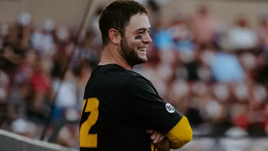 Mizzou baseball's Keegan Knutson smiles in the dugout