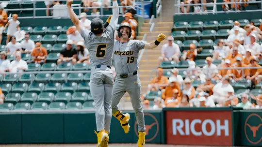Blaize Ward celebrates a home run at No. 6 Texas with teammate Tyler Macon on May 16, 2026