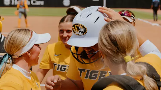 Abby Hay celebrated after hitting a home run for her 100th career hit