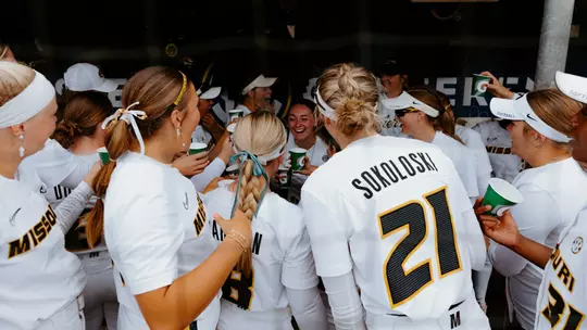 Mizzou softball in the dugout at the SEC Tournament
