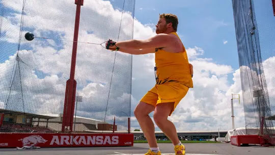 Sam Innes competes in the hammer throw during the first day of the 2026 NCAA West First Round on Wednesday, May 27 at the John McDonnell Field in Fayetteville, Ark.