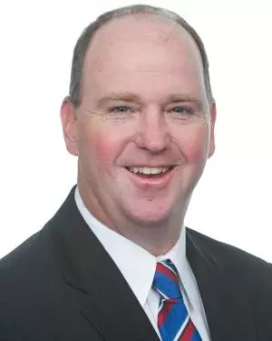 A headshot of Skip Holtz.