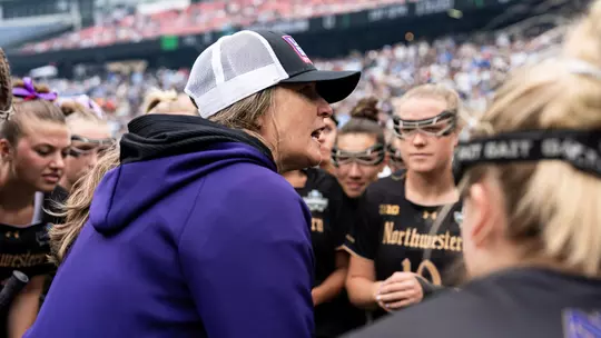 Northwestern head coach Kelly Amonte Hiller coaches her team in the national championship game against UNC.