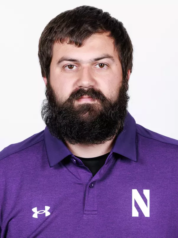 August 21, 2025, Evanston, IL: Staff members of the Northwestern Football team pose for photos at Walter Athletics Center in Evanston, IL on Thursday, August 21, 2025. (Photo by Griffin Quinn/Northwestern Athletics)