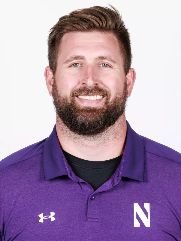 August 21, 2025, Evanston, IL: Staff members of the Northwestern Football team pose for photos at Walter Athletics Center in Evanston, IL on Thursday, August 21, 2025. (Photo by Griffin Quinn/Northwestern Athletics)