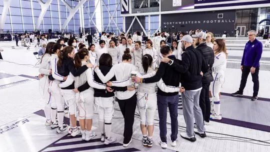 Fencing Team Huddle