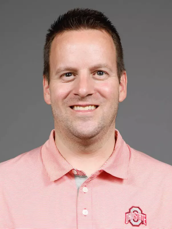 A headshot of Micheal Basford