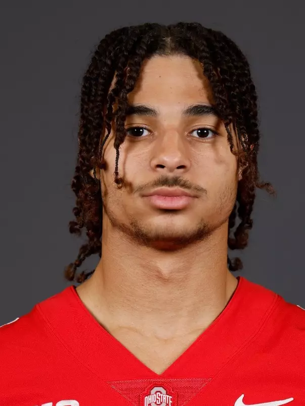A headshot of Grayes