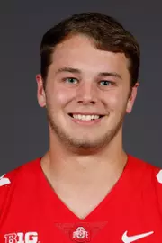 A headshot of Sam Hart