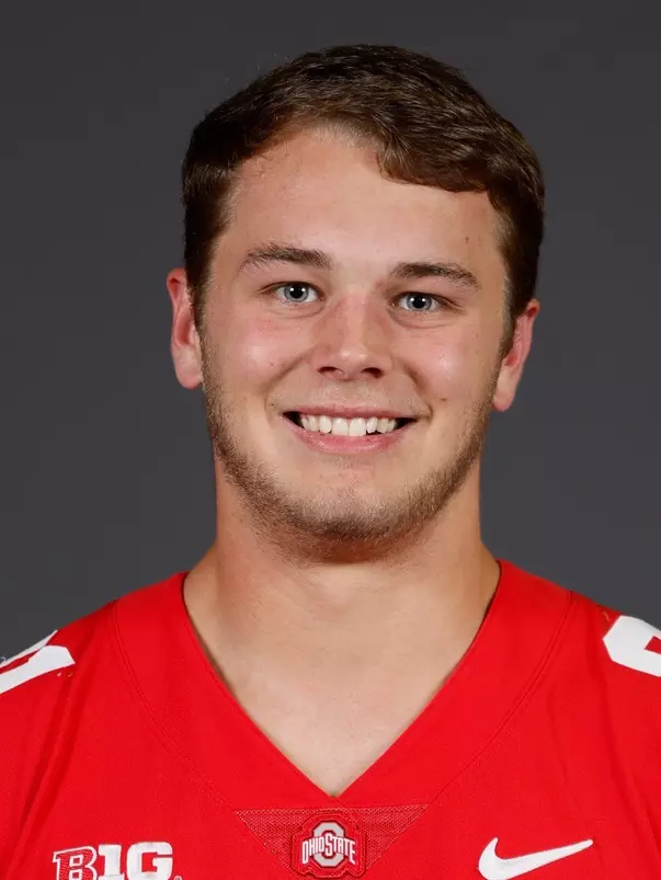 A headshot of Sam Hart