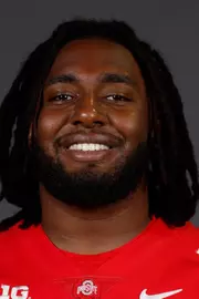 A headshot of Donovan Jackson