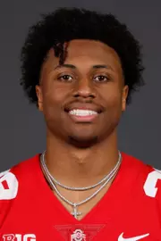 A headshot of Andrew Moore