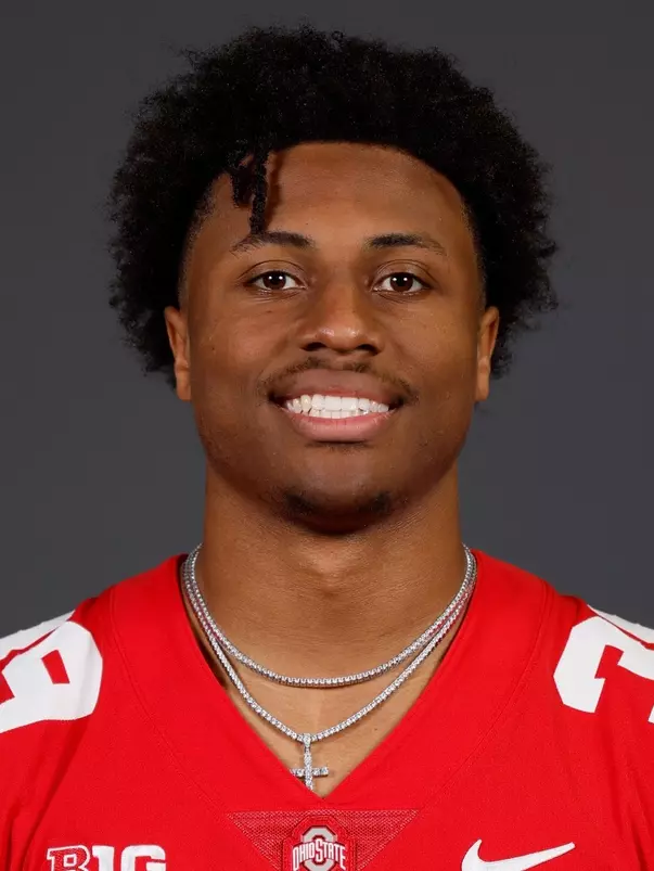 A headshot of Andrew Moore