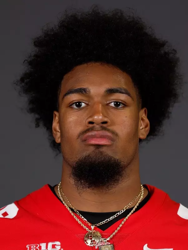 A headshot of Josh Simmons