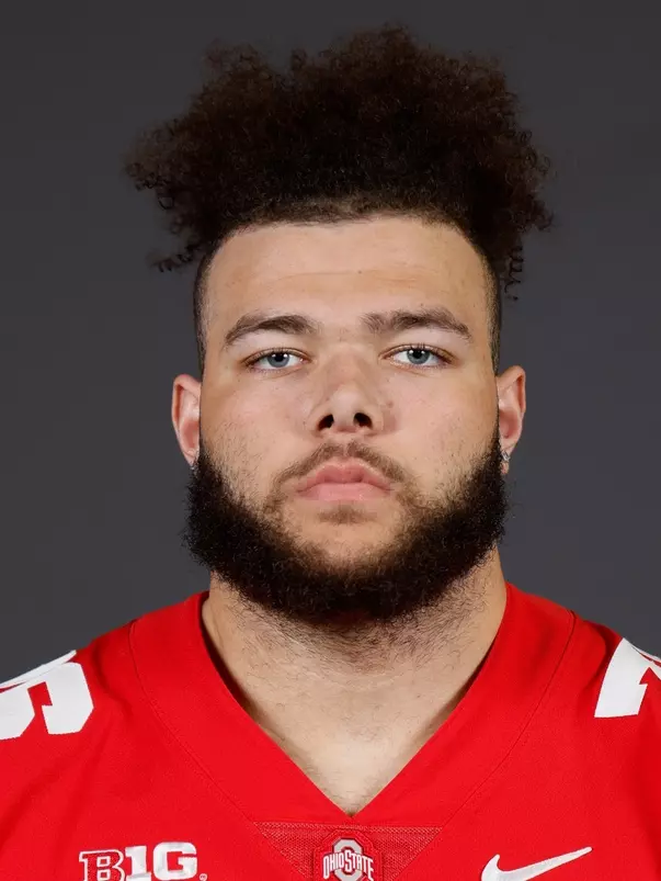 A headshot of Miles Walker
