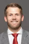 Coat and tie headshots of the football team on June 14, 2019.