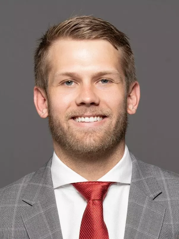 Coat and tie headshots of the football team on June 14, 2019.