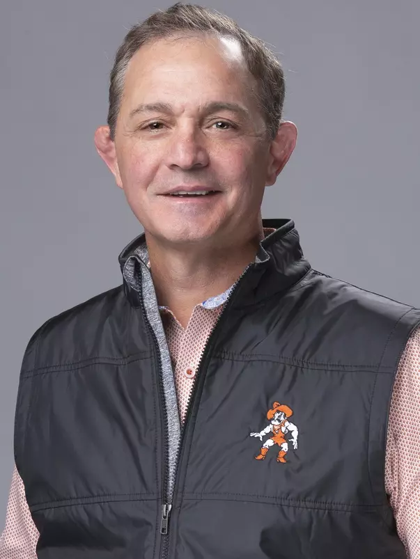 Oklahoma State University Wrestling Head Coach John Smith Taken Wednesday, October 16, 2019, Orange Power Studios, Stillwater, OK. Bruce Waterfield/OSU Athletics
