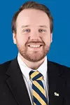 A headshot of Carter Pickering