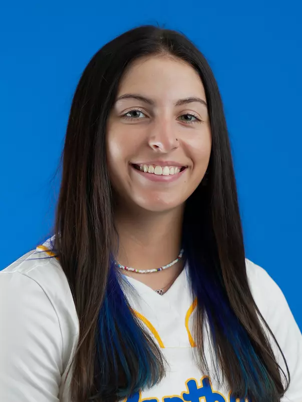 Headshot of Adriana Romano White Uniform