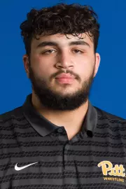 Headshot of Mustafa Woodi