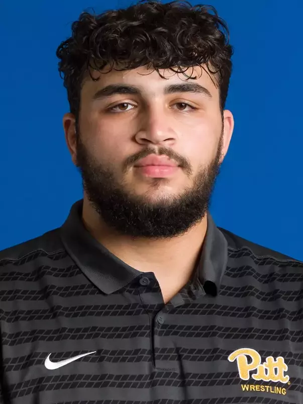 Headshot of Mustafa Woodi