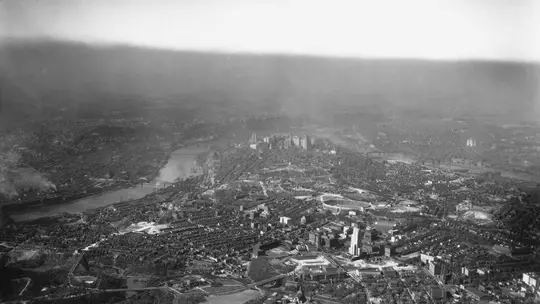 View of Pittsburgh looking toward Oakland and Downtown. Shows the Cathedral of Learning under construction.