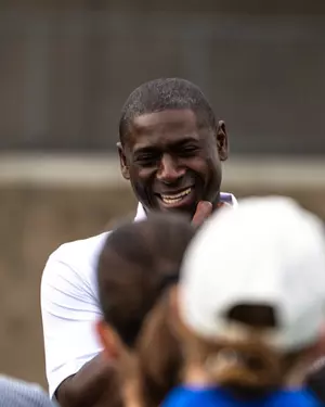 Allen Greene speaks to a team