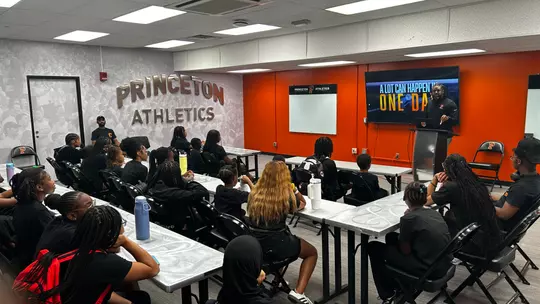 Students of Tigers Together Journey to Athletics meeting in Zanfrini Conference Room