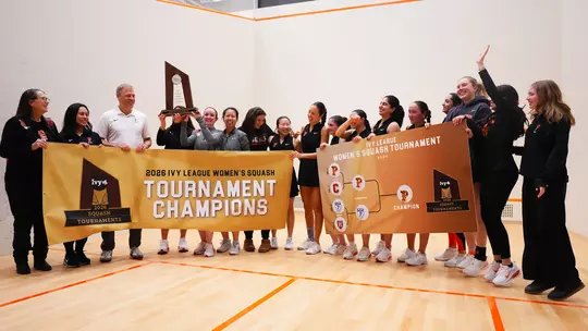 ivy women's squash trophy banner celebration photo