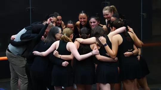 women's squash huddle photo