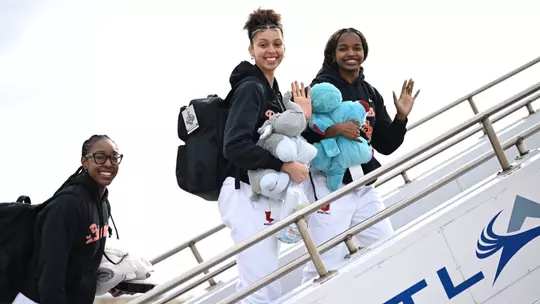 WBB on airplane steps heading to LA for NCAA tournament