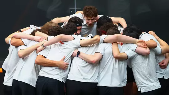 men's squash huddle photo