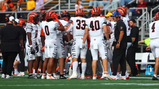 Football sideline vs. Bryant