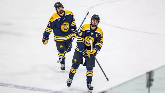 Victor Czerneckianair and Tyler Borgula Skate Through the Line After a Bobcat Goal (Jan. 16, 2026 in Hamilton, N.Y.)