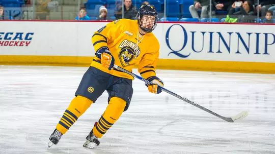 Devon Toews Waits for the Puck Against Cornell