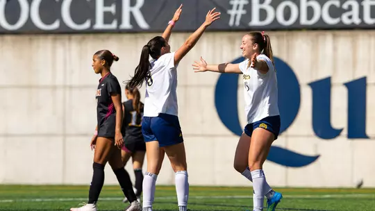 Isabella Torelli and Morgan Cupo Celebrate Goal in Win over Iona (Oct. 10 in Hamden, Conn)