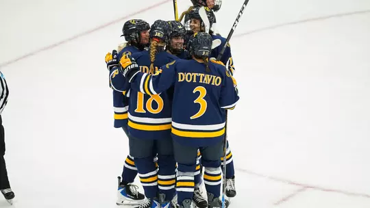 Alex Law goal celebration with group against Providence (Oct. 3 in Providence, RI)