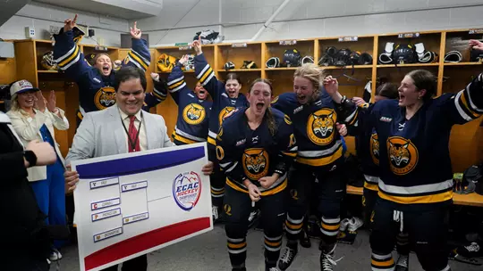 Avery Bairos & WIH Team Celebrating OT Win Against Princeton (3.6.26 in Lake Placid, NY)