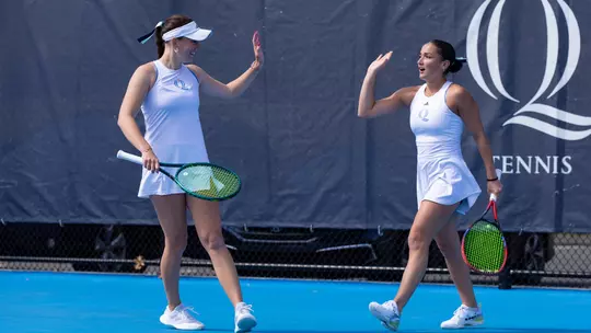 Caitlin Flower & Willow Renton High Fiving vs Marist (April 3, 2026 in Hamden, Conn.)